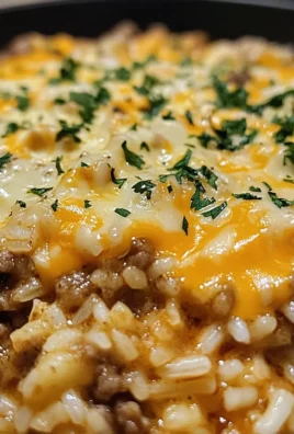 Garlic Butter Beef and Rice Skillet with Cheddar Parmesan Sauce