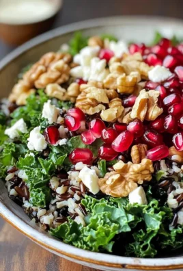 Pomegranate, Kale, and Wild Rice Salad with Walnuts and Feta