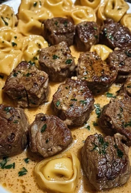 SMOTHERED STEAK BITES IN CREAMY VELVEETA TORTELLINI
