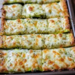 Cheesy Zucchini Breadsticks