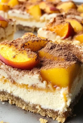 Peaches and Cream Desserts: Irresistible Peach Cobbler Cheesecake Bars for Every Occasion