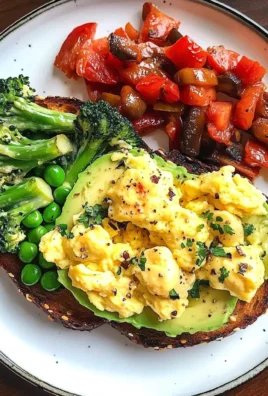 Avocado Toast with Scrambled Eggs & Sauted Veggies
