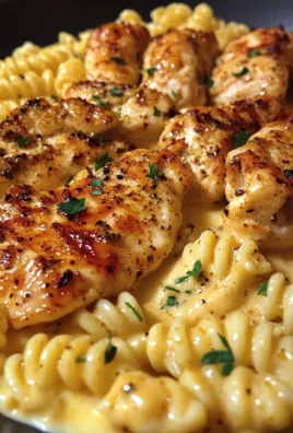 Cajun Garlic Chicken Rotini in Velveeta Cream Sauce