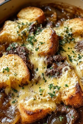 French Onion Beef Stew with Cheesy Bread Topping: A Cozy Gourmet Delight