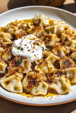 Manti (Turkish Dumplings) with Garlicky Yogurt and Spiced Oil